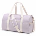 Sac de voyage 48 x 25 x 28 cm en textile lilas ¨¤ bandouli¨¨re avec poches zipp¨¦es